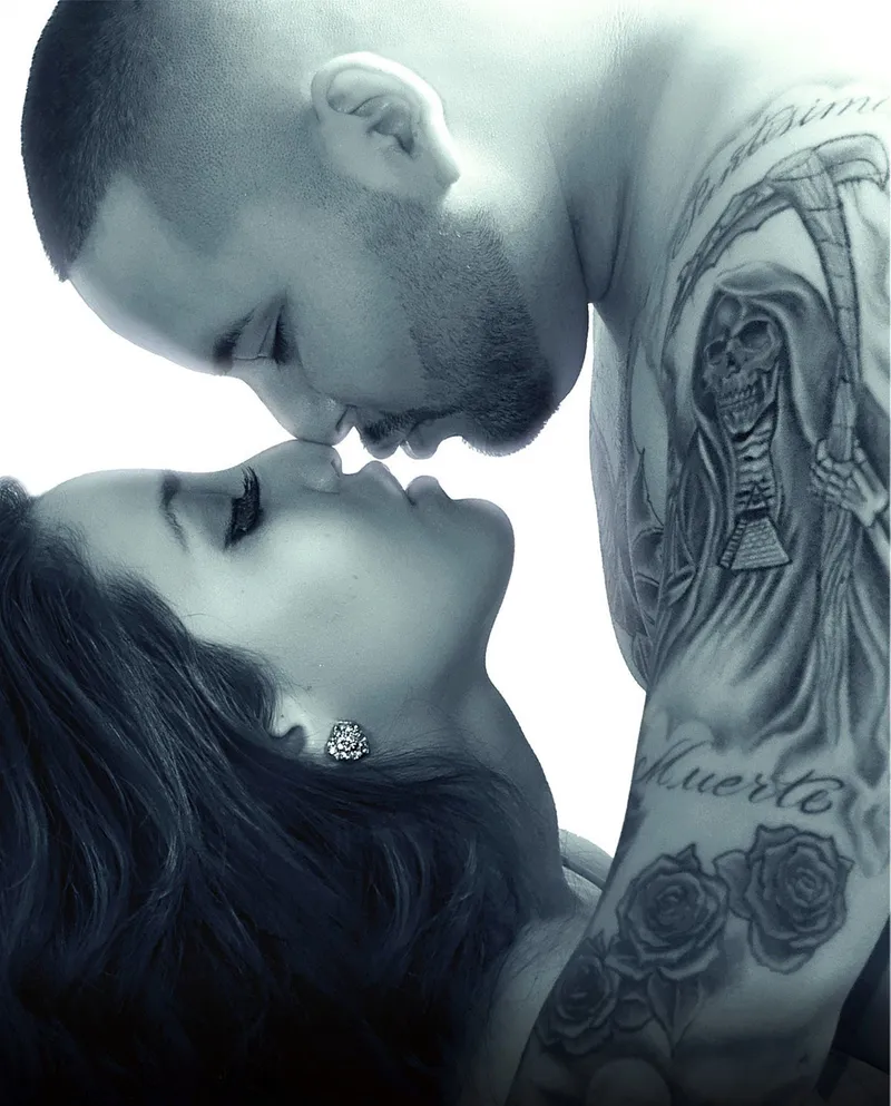 Black and white close-up of a couple touching noses